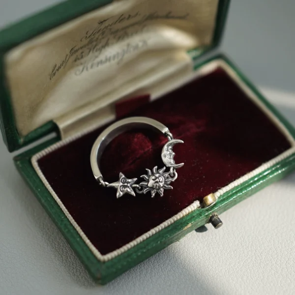 Water lilies come and go. Original design 925 sterling silver ring. Exquisite and versatile ring with stars, moon and sun elements.